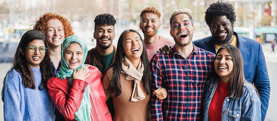 Diverse group of youth smiling at camera