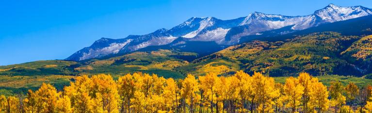 Colorado fall mountain landscape with snowy peaks