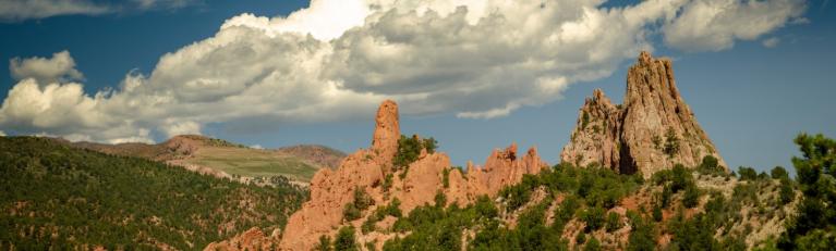 Garden of the Gods, red rocky mountains with cloudy skyline